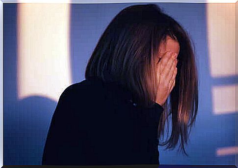 woman hiding her face