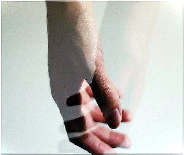 hands-real-and-transparent-entwined